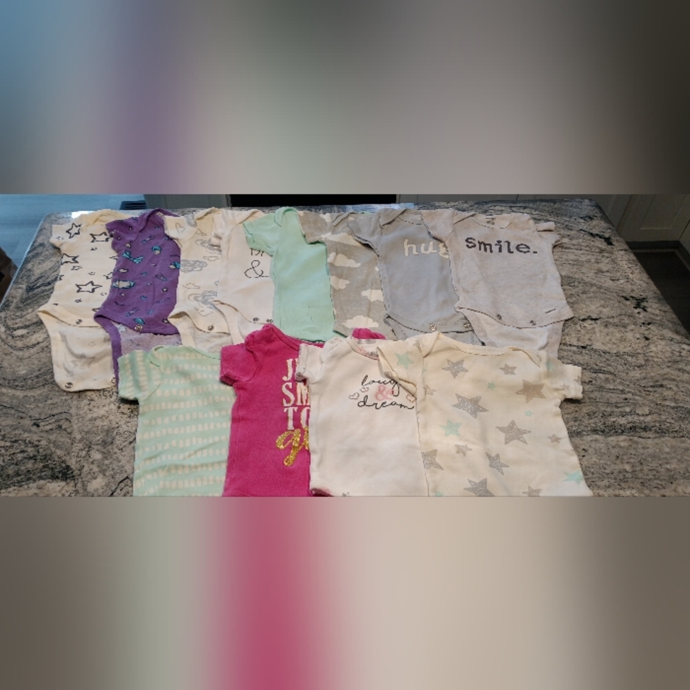 12.  0-3 month girl onsies